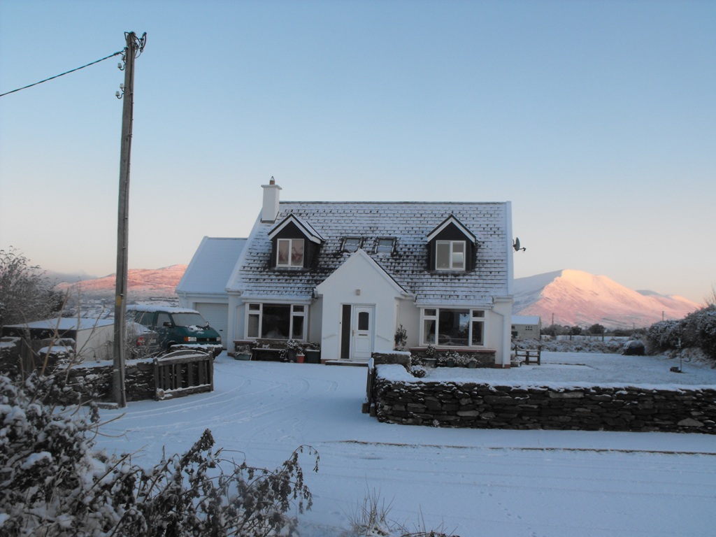 Snow on house